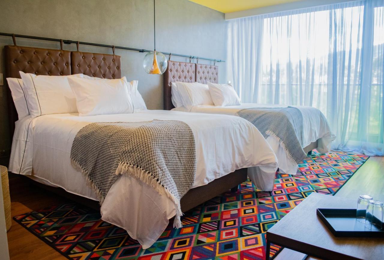 Hotel V1501 ปัสโต ภายนอก รูปภาพ A room at the hotel