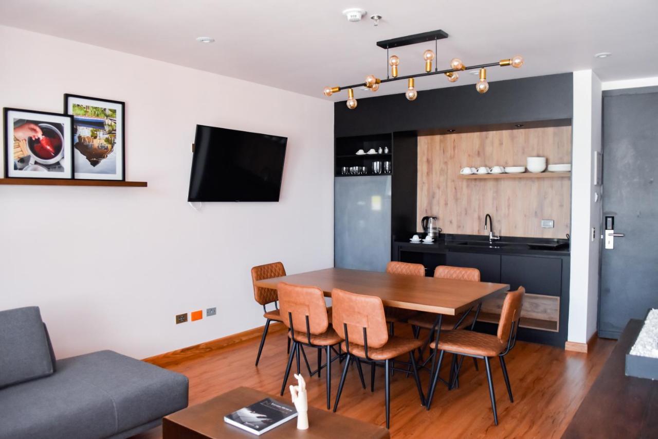Hotel V1501 ปัสโต ภายนอก รูปภาพ A kitchen in a serviced apartment