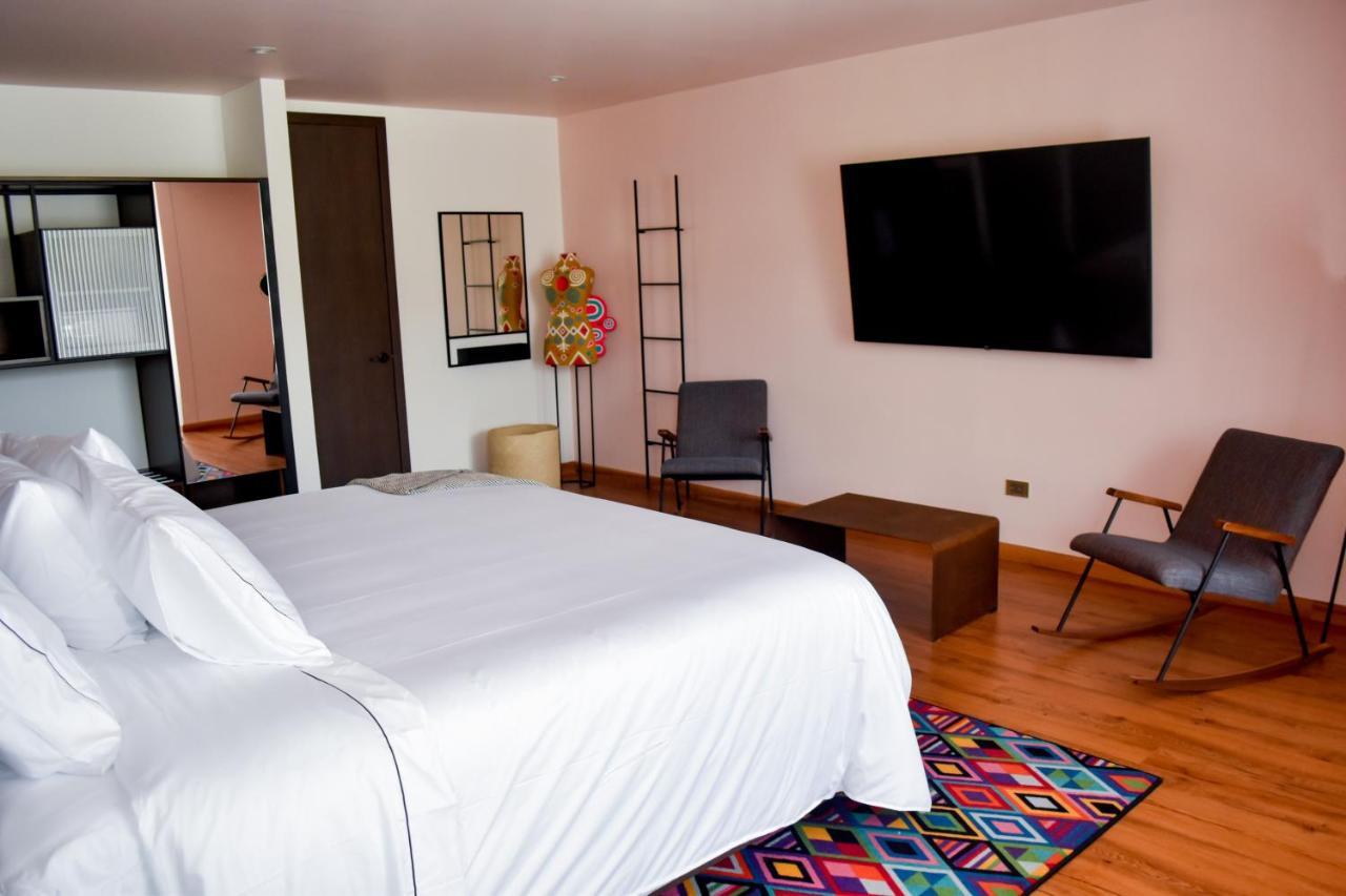 Hotel V1501 ปัสโต ภายนอก รูปภาพ A room at the hotel