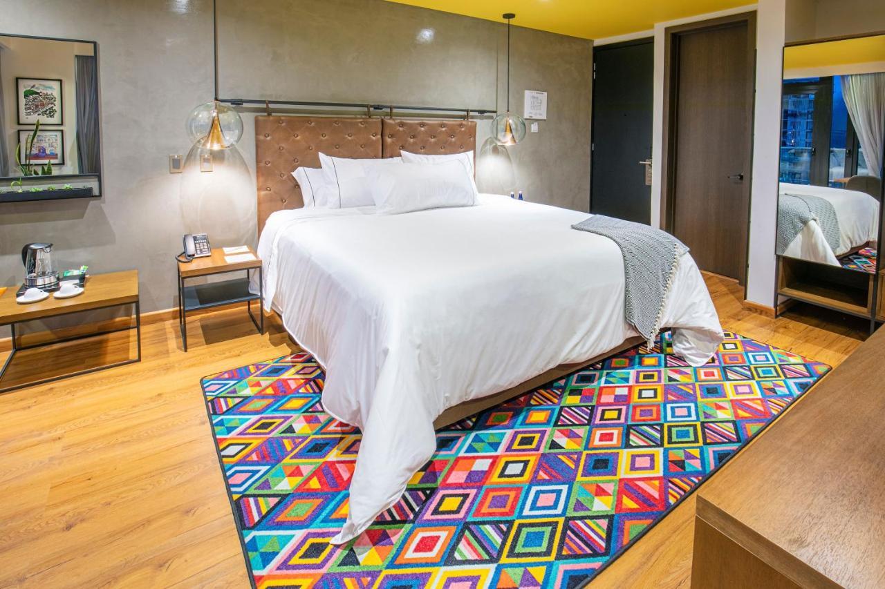Hotel V1501 ปัสโต ภายนอก รูปภาพ A carpet in a bedroom